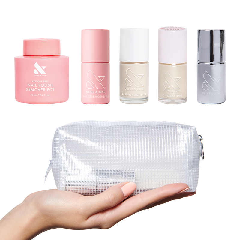Ally Rooker’s Nail Essentials Bundle with nail polish remover, strengthener, long-lasting polish, and clear pouch held in hand