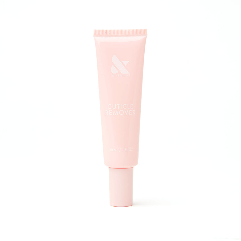 Soft pink tube of Cuticle Remover designed for gentle exfoliation and easy manicure care shown on white background