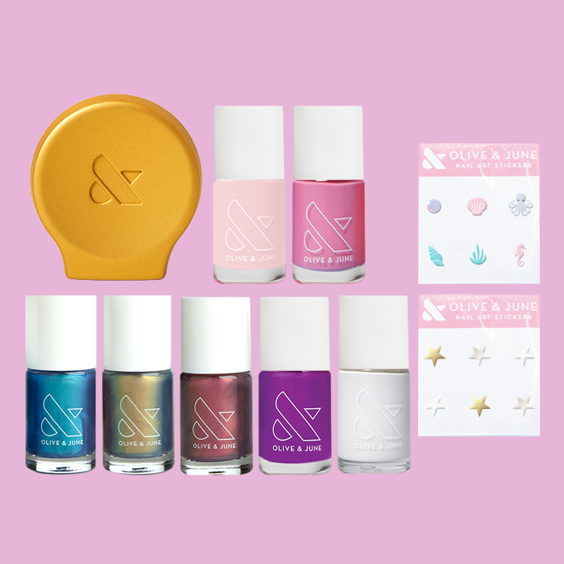 Mini Favorites Set with seven mini nail polishes, two sheets of nail art stickers, and limited edition gold Poppy mani kit