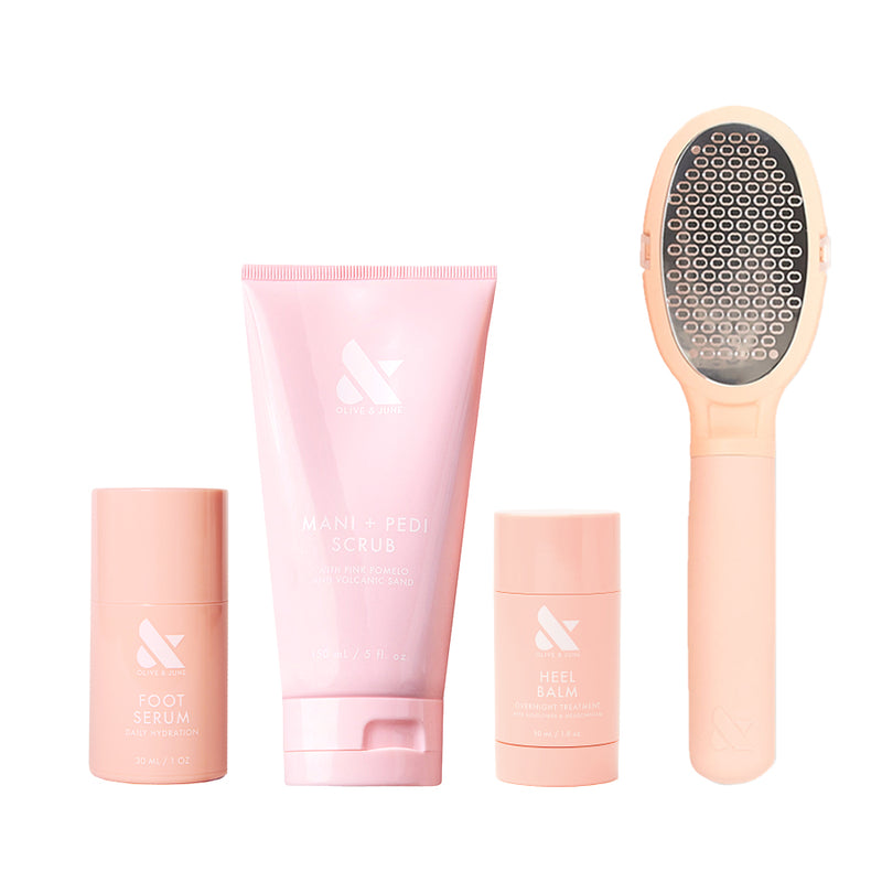 Foot Care Essentials Set with foot serum, mani + pedi scrub, heel balm, and foot file for soft, cared-for feet