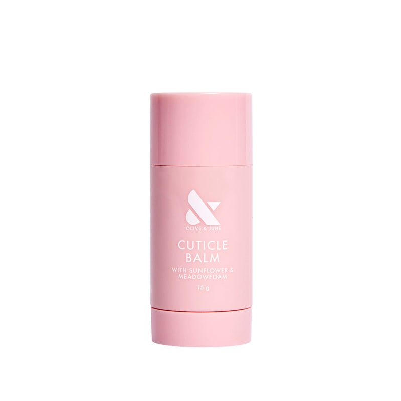 Cuticle Balm in a soft pink stick applicator for easy hydration of dry, cracked cuticles during at-home manicures