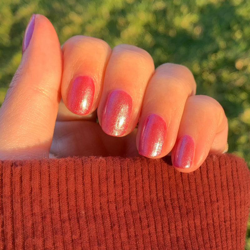 Frosted Berries Set shiny red manicure with subtle shimmer on oval nails for a festive at-home mani look