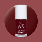 Jammy quick dry gel polish bottle in deep cabernet shade on round color swatch with muted background