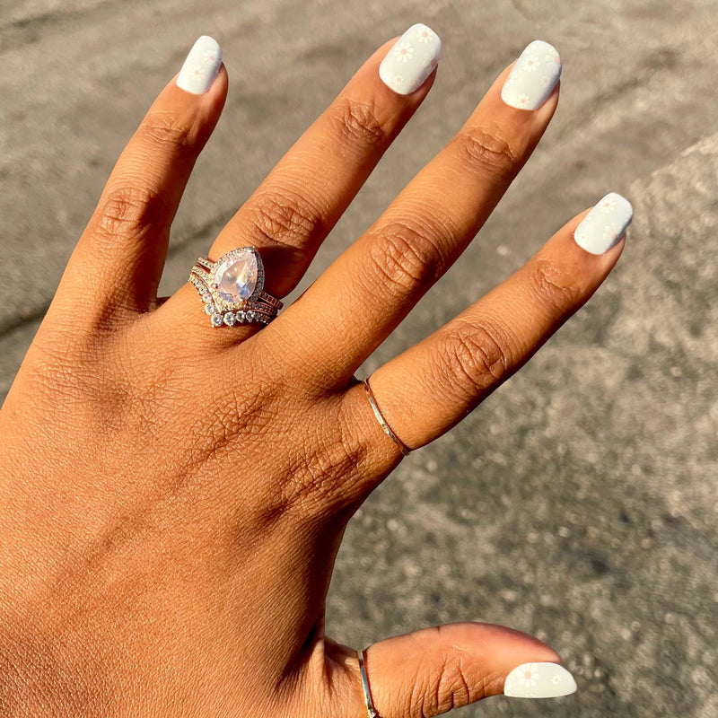 Angelfish Flower Shower - Press-On | Extra Short | Squoval pale blue nails with white daisy design for an easy at-home mani