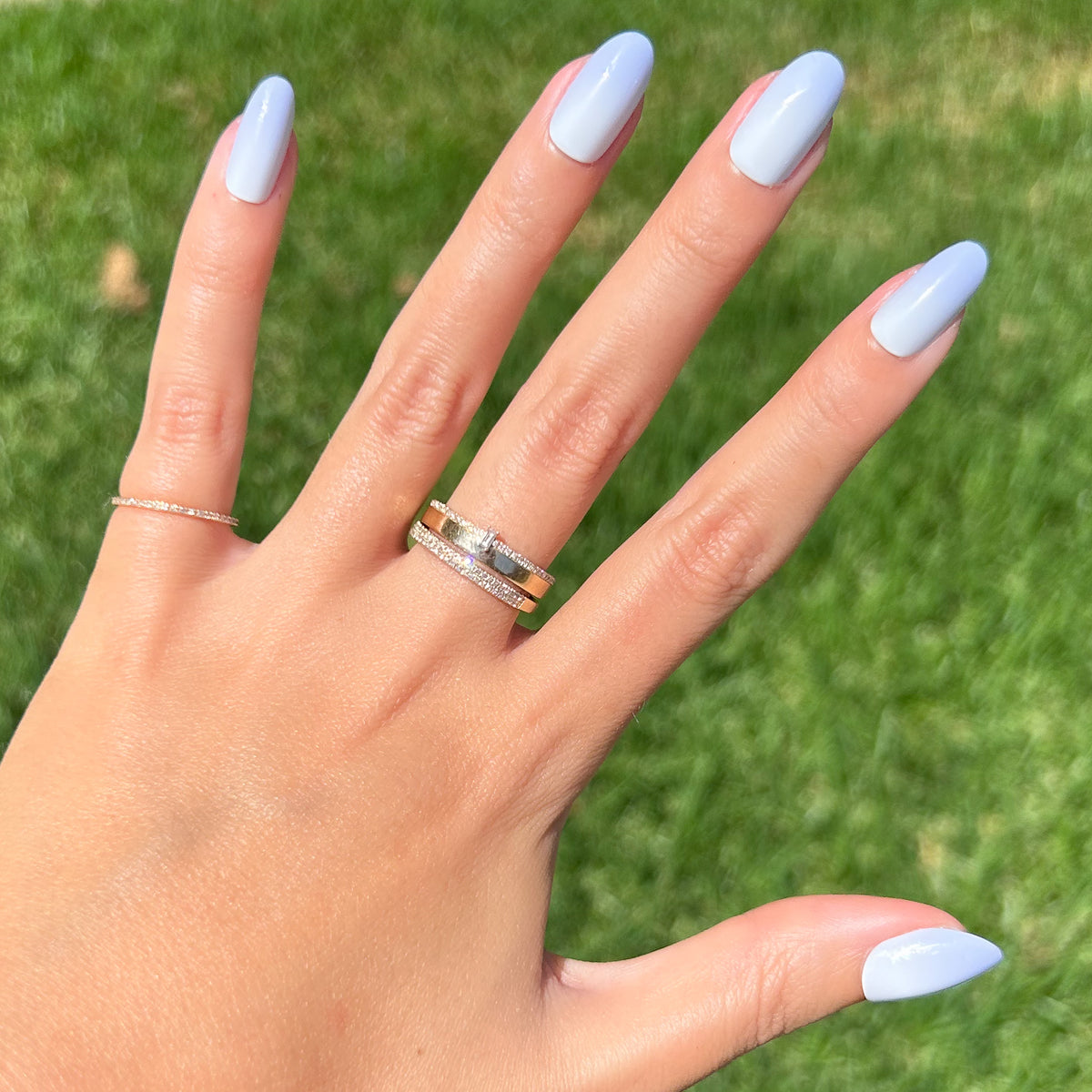 BP Ombre - Press-On | Medium | Almond showing hand outdoors with soft blue gradient medium almond false nails and rings
