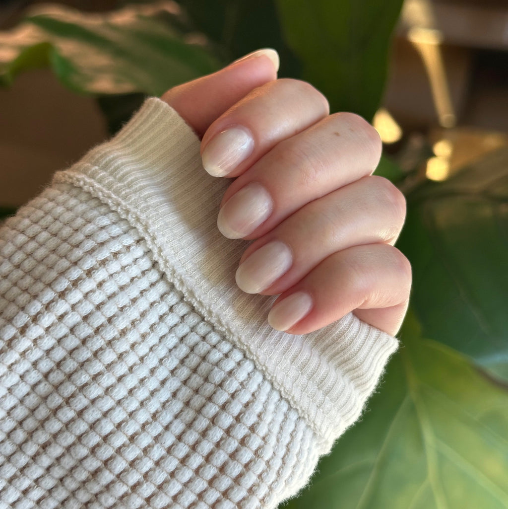 Atlas - Gel on natural nails with a smooth pearly white finish for an elegant mani by Olive and June