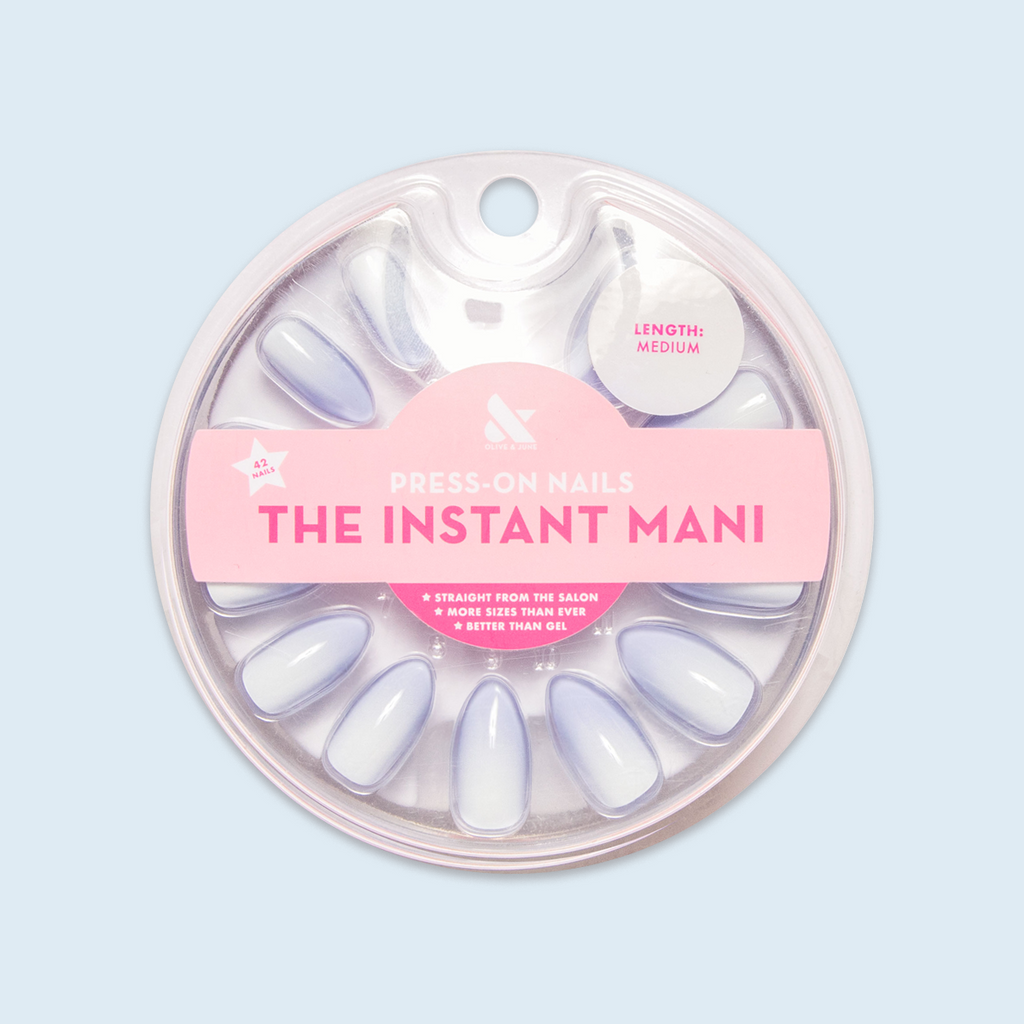BP Ombre - Press-On | Medium | Almond showing soft blue gradient false nails in medium almond shape in clear circular packaging