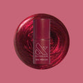 Budget? What Budget Gel deep rose-orange duochrome gel polish bottle with swirled polish background for manicure by Olive and June thumbnail