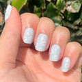 Angelfish Flower Shower - Press-On | Extra Short | Squoval pale blue nails with white daisy floral design for at-home mani thumbnail