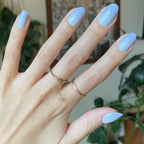 BP Ombre - Press-On | Medium | Almond showing hand with soft blue gradient medium almond press-on nails and gold rings
