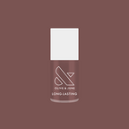 Bottle of Olive and June Clocking Out Early long-lasting gel polish in neutral minky brown shade on matching background