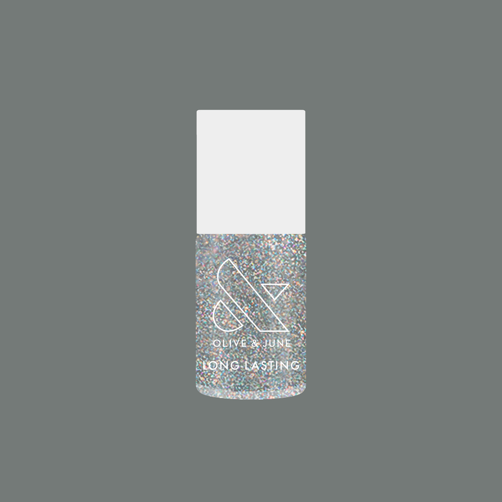 Glitter Department holographic silver glitter nail polish bottle by Olive and June for long-lasting mani looks