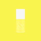 Game Set Mani nail polish bottle in bright neon yellow for quick-dry and long-lasting at-home manicure looks