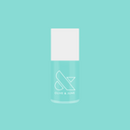 Slam Dunk nail polish bottle in true turquoise shade by Olive and June for vibrant at-home manicure.