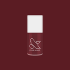Olive and June polish bottle in Don’t Spill on the White Couch deep dusty berry red gel polish shade