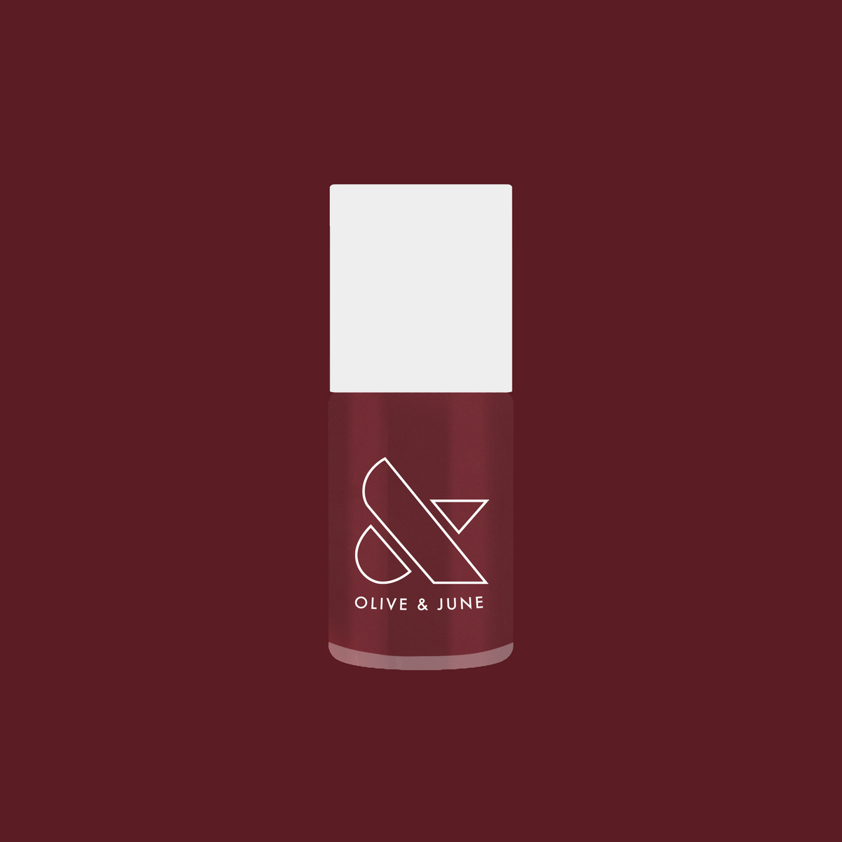 Olive and June polish bottle in Don’t Spill on the White Couch deep dusty berry red gel polish shade