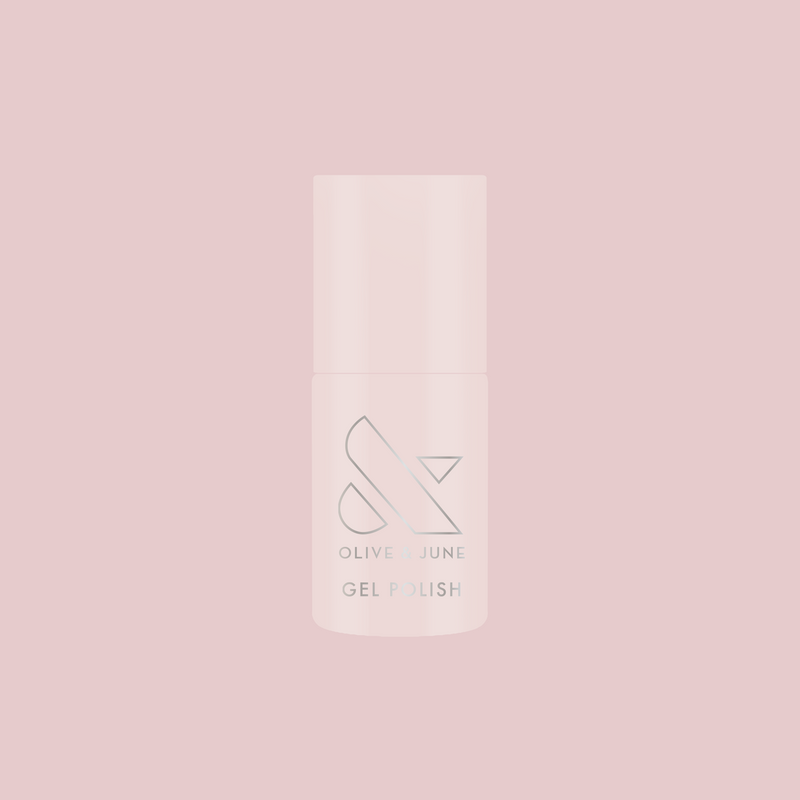 CCT - Gel polish bottle on a soft pink background for a feminine, sheer gel manicure by Olive and June