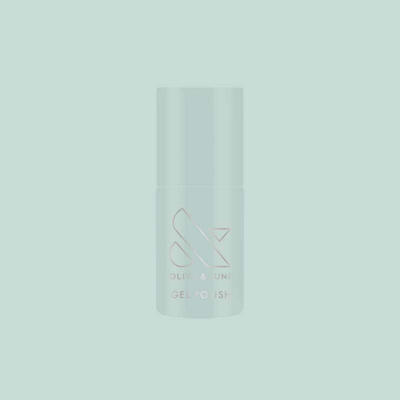 KMC - Gel bottle shown in sage green packaging on a matching background representing long-lasting gel polish by Olive and June