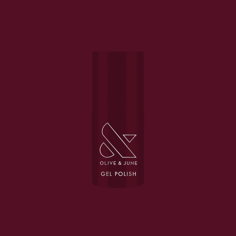 Obsessed - Gel bottle shown in a deep dark ruby shade for a rich, long-lasting gel manicure by Olive and June