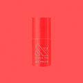 Bottle of Rodeo Queen - Gel nail polish in bright pinky-red with silver shimmer by Olive and June on red background thumbnail