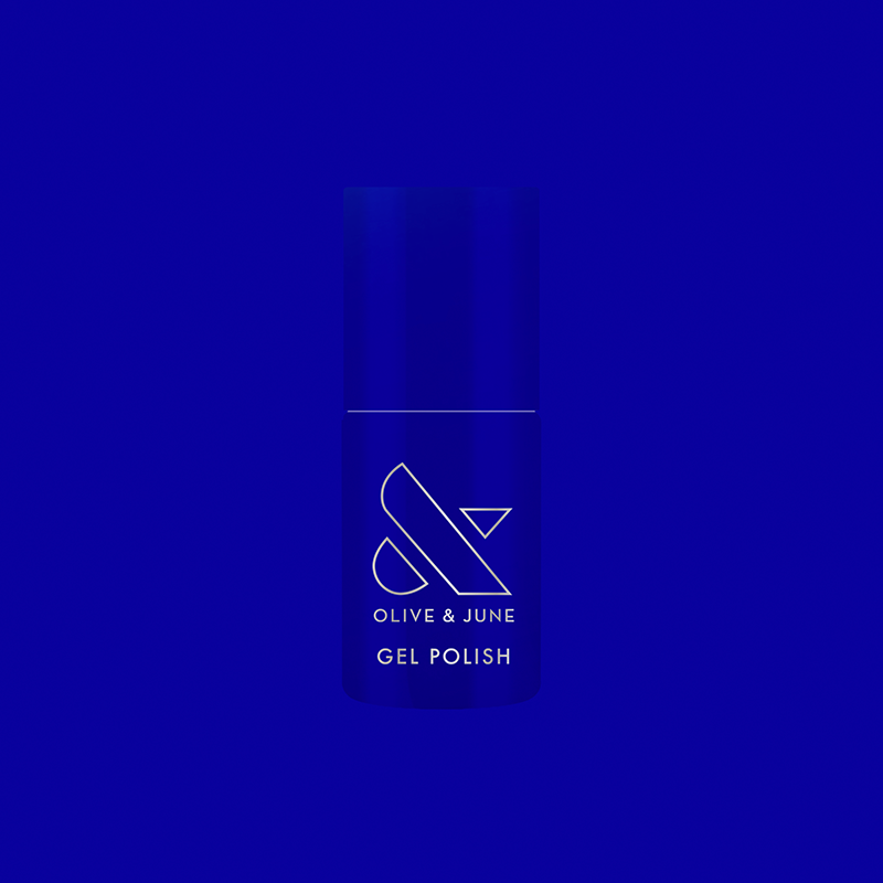 Bottle of Your Mani Looks So Good in Those Jeans - Gel nail polish in bright denim blue with Olive and June branding