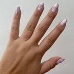 Groovy Swirl - Press-On | Short | Round pink and lavender round false nails with swirling design for easy at-home mani