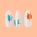 Chrome Burst - Press-On | Medium | Almond neutral nails with colorful chrome starburst designs on soft peach background