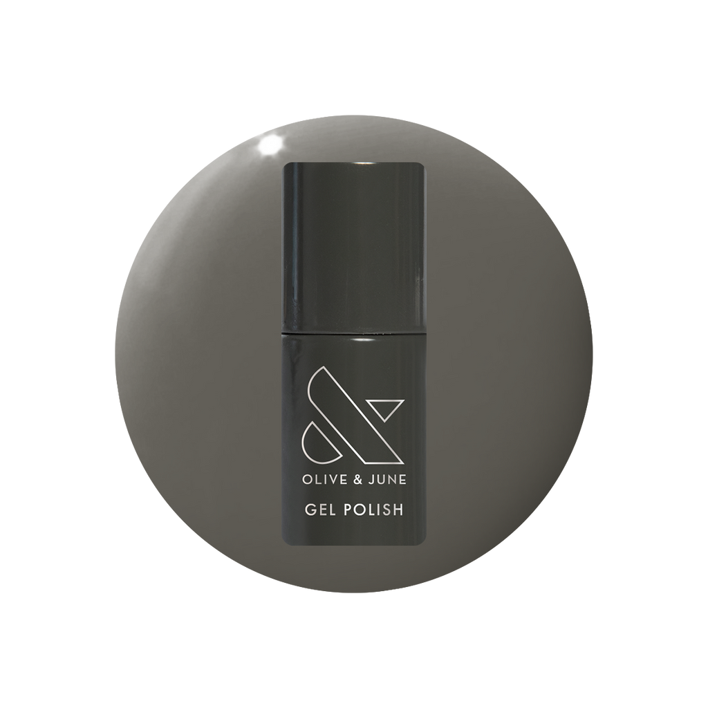 Is It Smoky In Here? Gel polish bottle with deep charcoal gray for a sleek, long-lasting mani by Olive and June