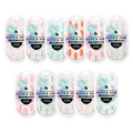 Sets of Effects & Solids Press-Ons by Olive and June in various colors and finishes for at-home manicures with lasting wear