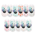 Sets of Effects & Solids Press-Ons by Olive and June in various colors and finishes for at-home manicures with lasting wear