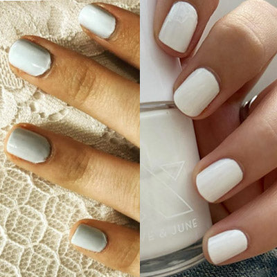 Side-by-side of hands with short nails painted in soft gray on the left and creamy white on the right over textured and plain backgrounds