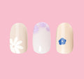 Floral Trio showing three beige and white press-on nails with delicate blue and purple floral designs for easy mani application thumbnail