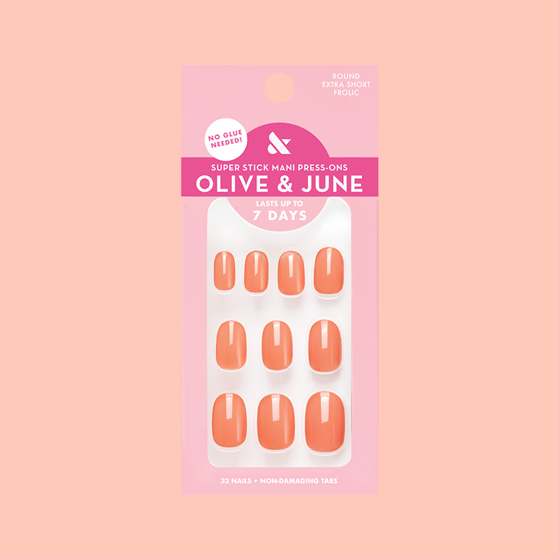 Frolic | Extra Short | Round - Tab Press-On nails in bright orangey coral shade for easy at-home mani application