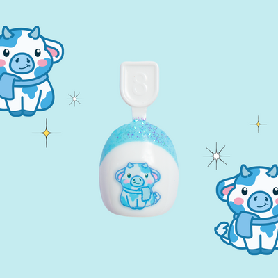 Fuzzy Winter Cow French - Pressies | Extra Short Short | Round showing blue nails with cute fuzzy winter cow designs in packaging Fuzzy Winter Cow French - Pressies | Extra Short Short | Round  Pressies