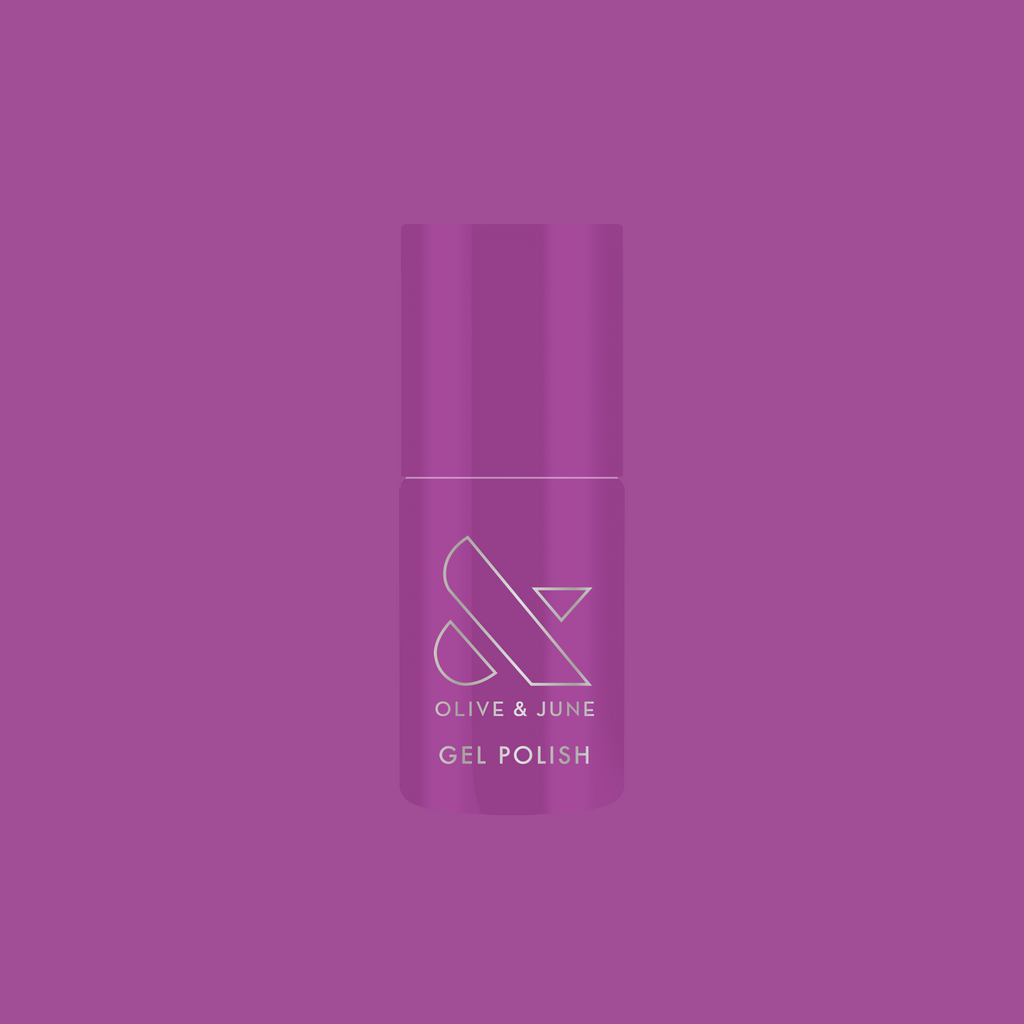 Bottle of Olive and June Petal - Gel polish in vibrant floral purple shade on matching purple background