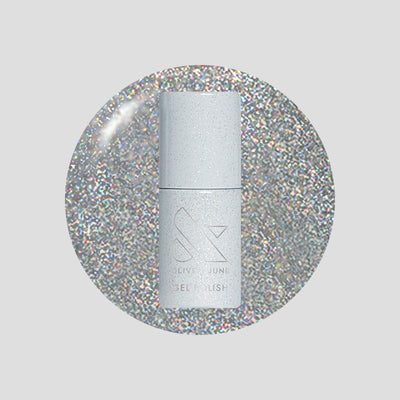 Silver nail polish bottle on a glittery silver background Glitter Department Gel fine holographic glitter Gel Polish