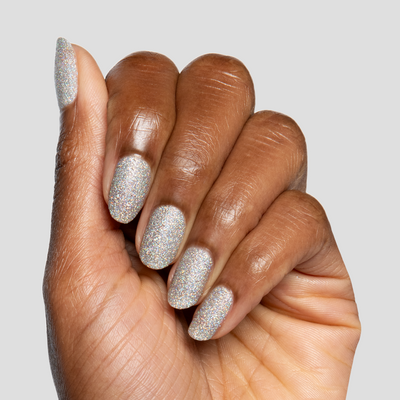 Glitter Department silver holographic polish on nails with a shimmering long-lasting mani by Olive and June Glitter Department fine holographic glitter Nail Polish