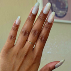 Glitter Department ultra fine holographic silver polish on natural nails for a shimmering at home manicure look by Olive and June