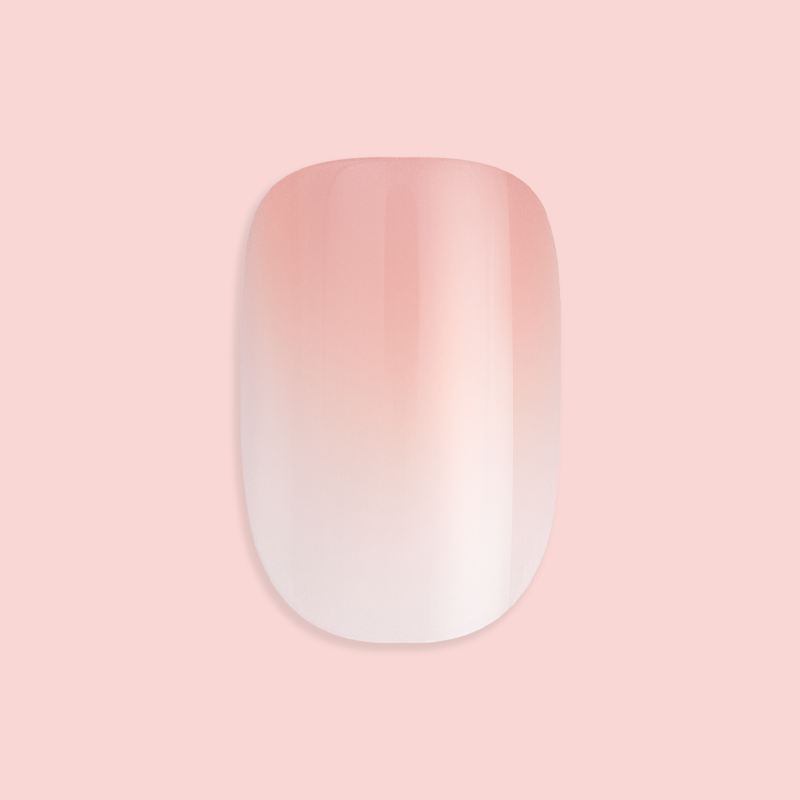 HZ Syrup Gradient - Press-On | Extra Short | Squoval showing single extra short squoval false nail with rosey beige gradient manicure
