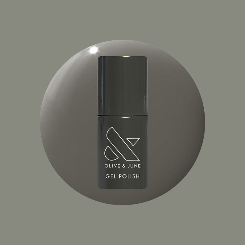 Is It Smoky In Here? Gel polish bottle in deep charcoal gray for a sleek and long-lasting mani by Olive and June