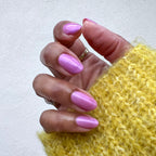 Island Time shimmery lilac purple gel polish on natural nails for a smooth, long-lasting at-home manicure by Olive and June