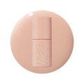 Bottle of KAG - Gel gel polish in neutral peachy pink shade on matching peach background