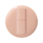 Bottle of KAG - Gel gel polish in neutral peachy pink shade on matching peach background