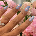Valentine Mini Polish Set nails with sky blue polish and soft pink heart sequins for a charming at-home mani look thumbnail