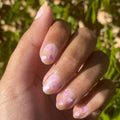 Valentine Mini Polish Set showing natural nails with soft pink heart sequins for a delicate at-home mani look thumbnail