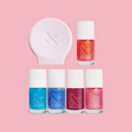 Mini Goldfish Iridescent Set with five shimmering nail polishes and a pink mani stabilizer for neat at home manicures thumbnail