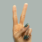 Hand showing peace sign with long nails painted in Martini Chrome gel polish with deep olive and golden shimmer