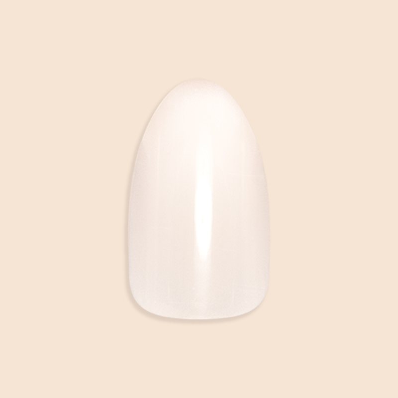 Milky Syrup Gradient - Press-On | Medium | Almond showing a single medium almond false nail in soft milky white gradient polish