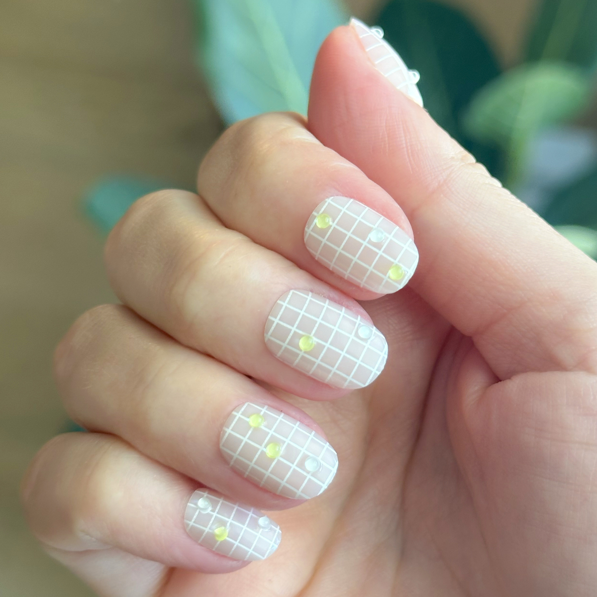 Nothing But Net - Press-On | Extra Short | Round with neutral grid pattern and subtle green tennis ball accents for easy at-home manicure