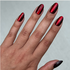 Obsessed Velvet - Press-On | Medium | Oval deep red cat eye velvet finish false nails on hand with natural skin tone